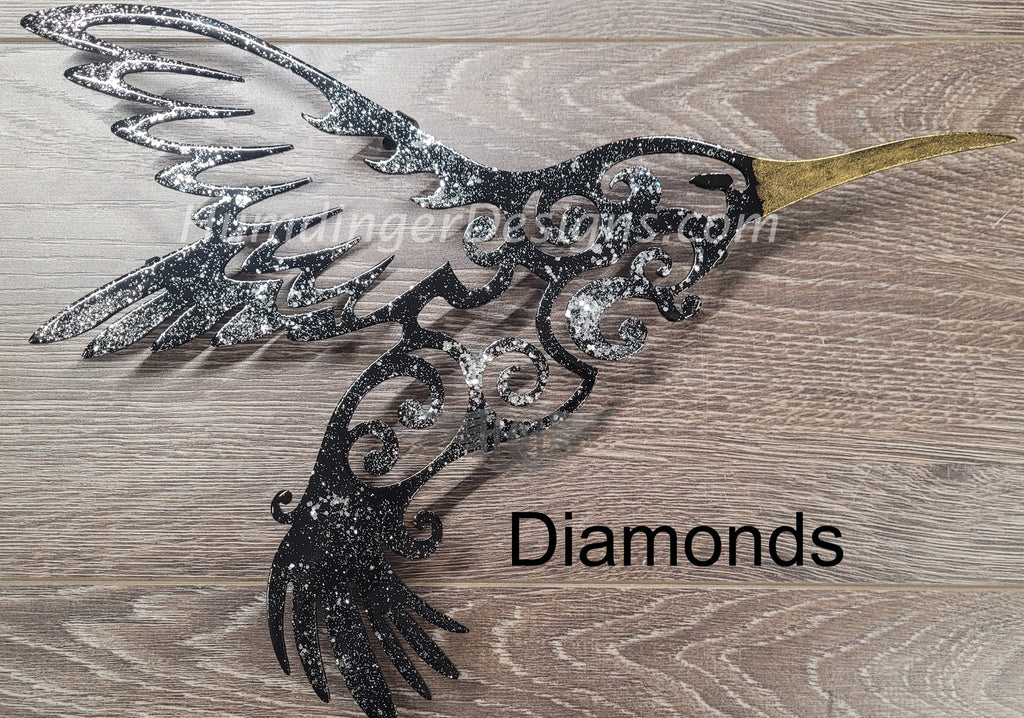 Hand-painted metal art hummingbird decor in black and gold, featuring intricate designs and premium quality craftsmanship.