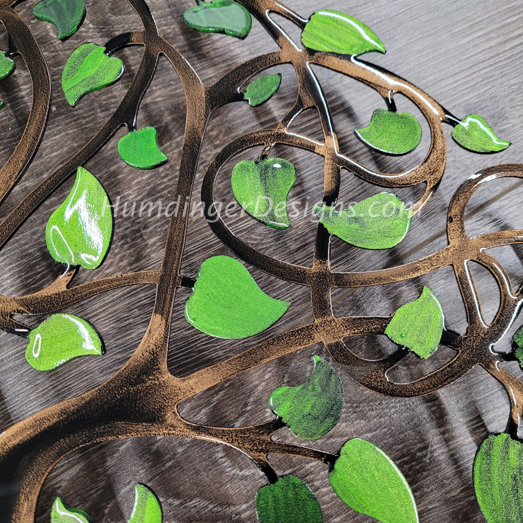 Handmade Infinity Tree metal art wall decor featuring hand-painted green leaves for premium quality design. Free shipping included.