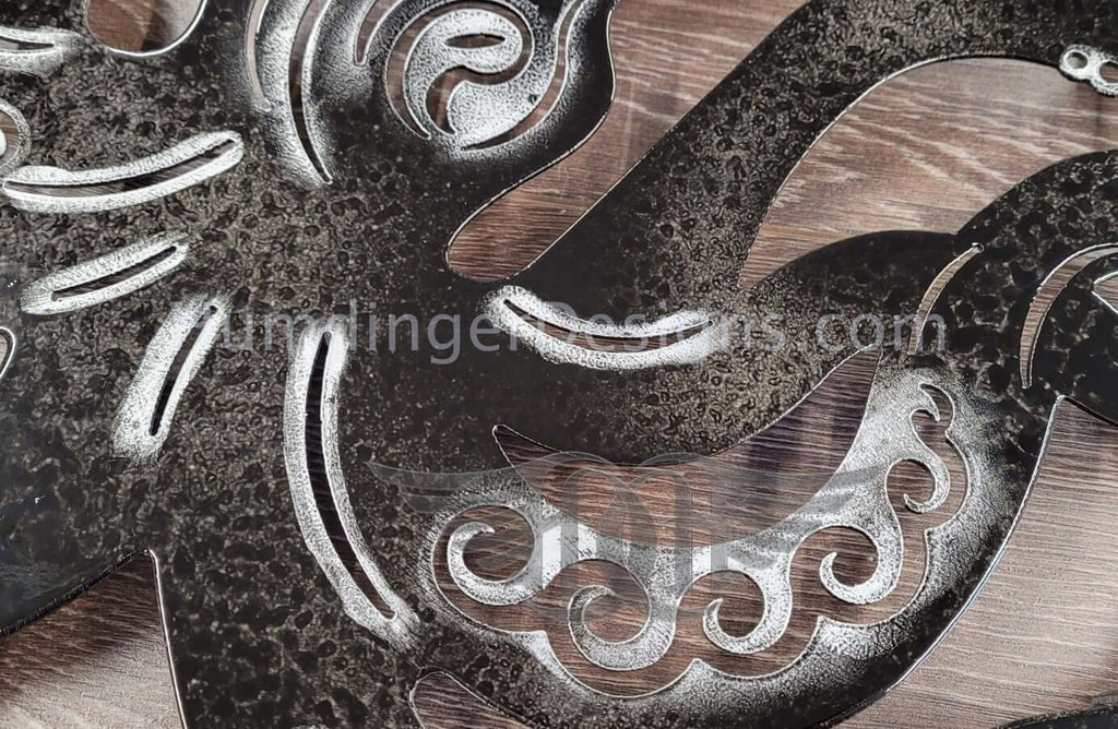 Metal Art for your wall in the shape of an Octopus with our special Noir finish by Humdinger Designs.